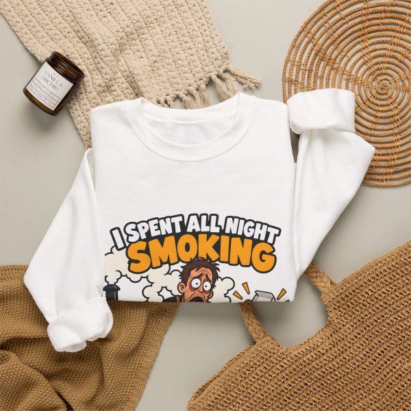 White crewneck sweatshirt with "I Spent All Night Smoking... The Kids Asked for Nuggets" BBQ dad graphic, lifestyle flat-lay