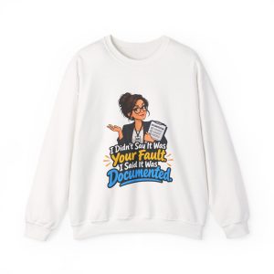 White crewneck sweatshirt printed on the front with a smug HR manager in glasses, a black blazer and an HR badge shrugging while hugging a clipboard labeled DOCUMENTATION and the words "I Didn't Say It Was Your Fault. I Said It Was Documented."