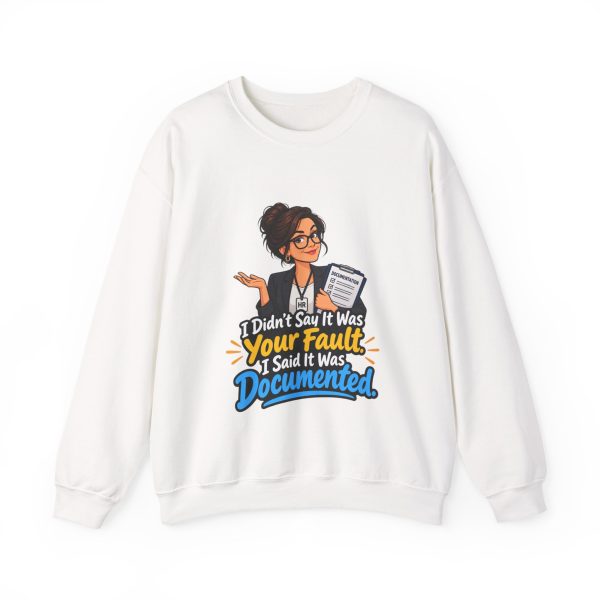 White crewneck sweatshirt printed on the front with a smug HR manager in glasses, a black blazer and an HR badge shrugging while hugging a clipboard labeled DOCUMENTATION and the words "I Didn't Say It Was Your Fault. I Said It Was Documented."
