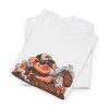 Folded white T-shirt showing "Char Marks Are Flavor Freckles" BBQ graphic