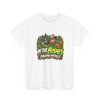 White disc golf T-shirt printed with IN THE BUSHES FINDING MYSELF and a disc golfer in a cap peering out of dense green bushes with leaves in his hair
