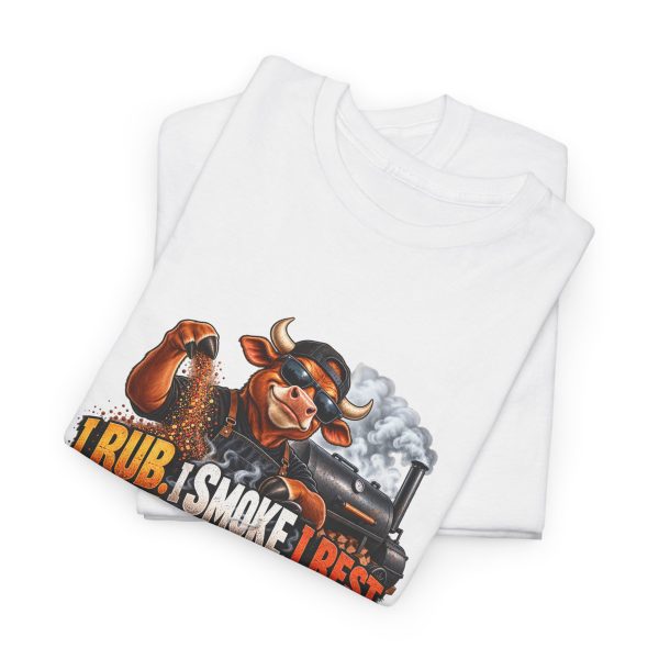 Folded white T-shirt showing "I Rub. I Smoke. I Rest." BBQ graphic