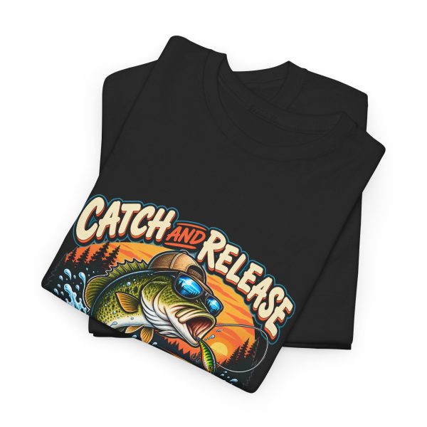 Folded black T-shirt showing "Catch and Release My Responsibilities" fishing graphic