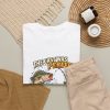 White T-shirt with "The Cast Was Perfect. The Fish Disagreed." fishing graphic, lifestyle flat-lay