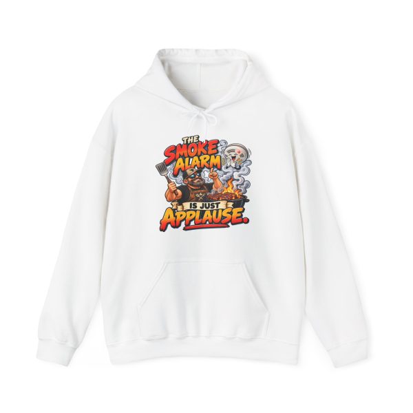White hoodie printed with "THE SMOKE ALARM IS JUST APPLAUSE." and a bearded griller in a cap, sunglasses and apron