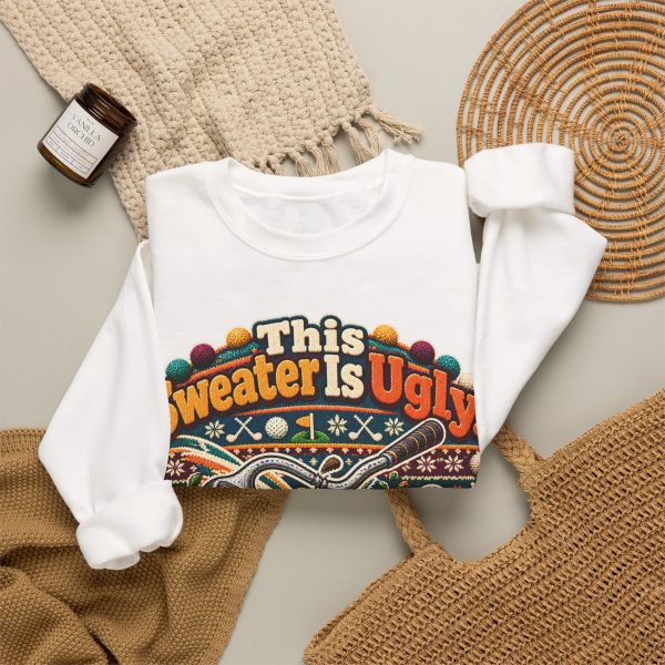 White crewneck sweatshirt with "This Sweater Is Ugly. You Should See My Golf Swing." golf, lifestyle flat-lay