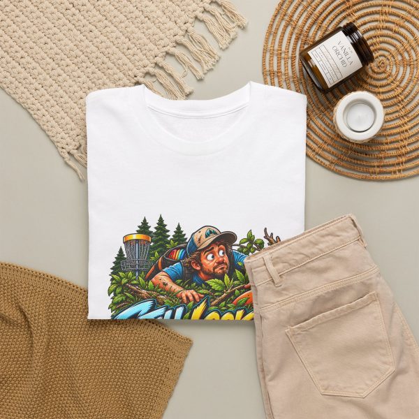 White T-shirt with "Still Looking for My Disc" disc golf graphic, lifestyle flat-lay