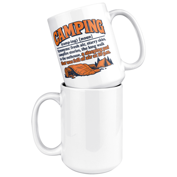15 oz white ceramic camping mug printed with an orange and navy CAMPING dictionary entry ending "a sleeping pad that was full of air at 10 p.m.", stacked