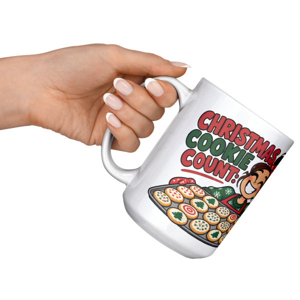 15oz white ceramic holiday baker Christmas mug printed with "Christmas Cookie Count: Baked 200. Tested 60.", raised angle