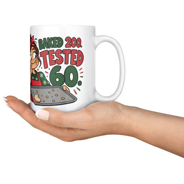 15oz white ceramic holiday baker Christmas mug printed with "Christmas Cookie Count: Baked 200. Tested 60.", serving