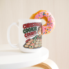 15oz white ceramic holiday baker Christmas mug printed with "Christmas Cookie Count: Baked 200. Tested 60.", with a donut