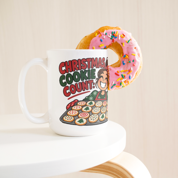 15oz white ceramic holiday baker Christmas mug printed with "Christmas Cookie Count: Baked 200. Tested 60.", with a donut