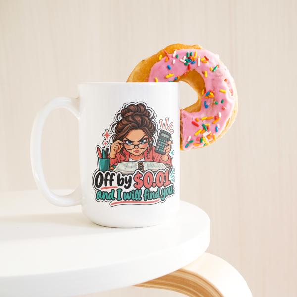Off by 0.01 and I Will Find You. 15oz mug - with a donut Off by $0.01 and I Will Find You. funny 15oz white coffee mug, on a table with a donut