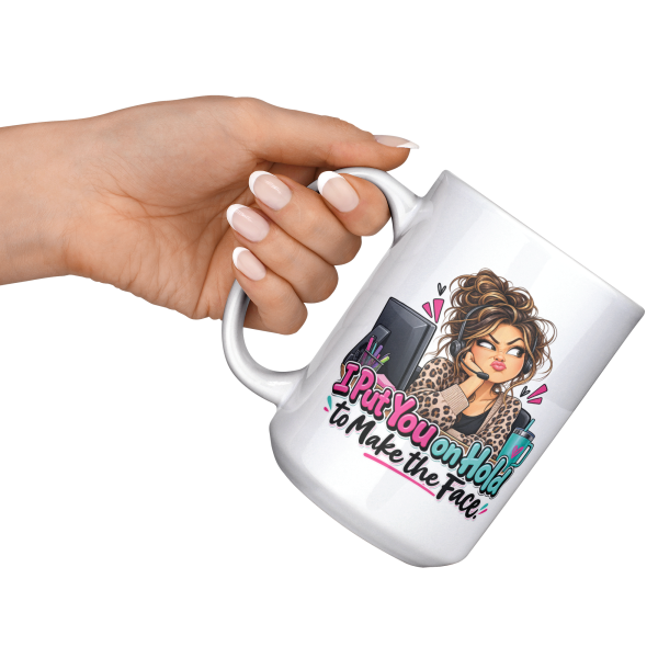 I Put You on Hold to Make the Face. funny 15oz white coffee mug, raised at an angle