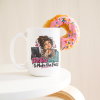 I Put You on Hold to Make the Face. funny 15oz white coffee mug, on a table with a donut