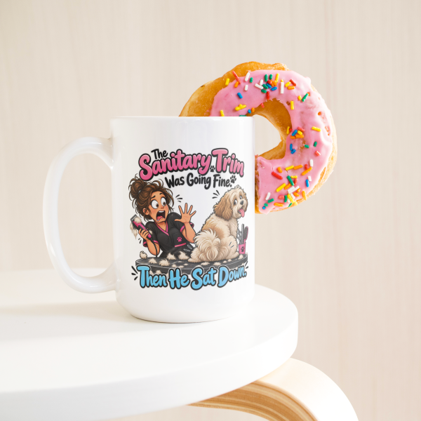 The Sanitary Trim Was Going Fine. Then He Sat Down. 15oz mug - with a donut The Sanitary Trim Was Going Fine. Then He Sat Down. funny 15oz white coffee mug, on a table with a donut