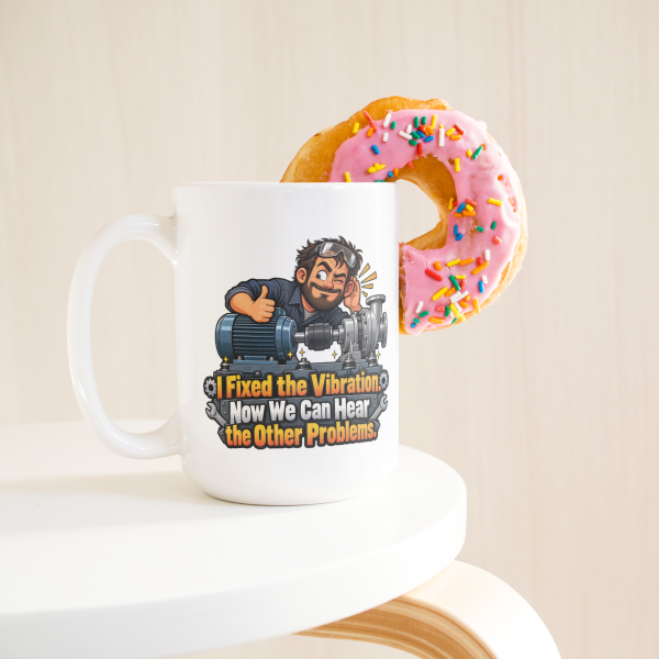 I Fixed the Vibration. Now We Can Hear the Other Problems. 15oz mug - with a donut I Fixed the Vibration. Now We Can Hear the Other Problems. funny 15oz white coffee mug, on a table with a donut