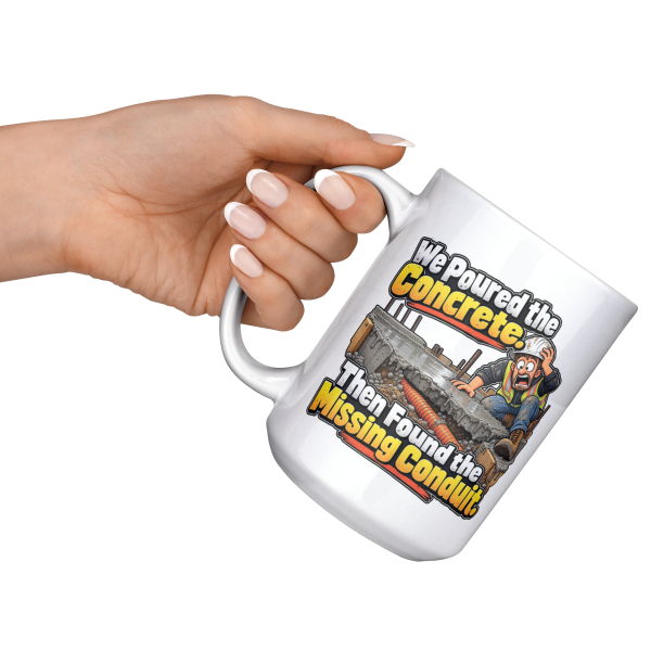 We Poured the Concrete. Then Found the Missing Conduit. funny 15oz white coffee mug, raised at an angle