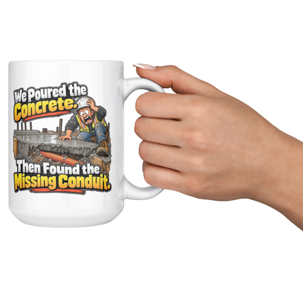 We Poured the Concrete. Then Found the Missing Conduit. funny 15oz white coffee mug, held up in a cheers