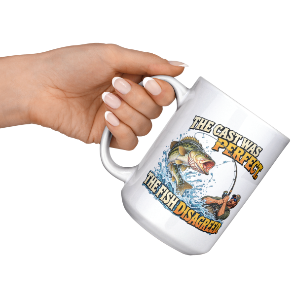 The Cast Was Perfect. The Fish Disagreed. funny 15oz white mug, raised at an angle