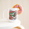 15oz white ceramic golf Christmas mug with a golfer in a Santa hat tiptoeing away from presents with his golf bag and the words My Christmas Escape Plan Has 18 Holes.