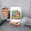 Par Is a Suggestion funny 15oz white mug, held at chest