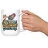 Lifestyle photo of the white 15oz hiking mug being raised for a cheers