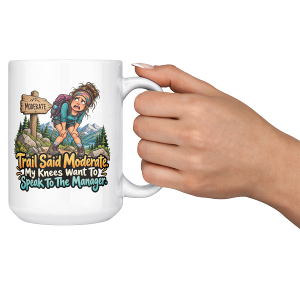 Lifestyle photo of the white 15oz hiking mug being raised for a cheers