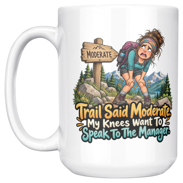 The same "Trail Said Moderate. My Knees Want To Speak To The Manager." design on the other side of the white 15oz mug, handle on the left