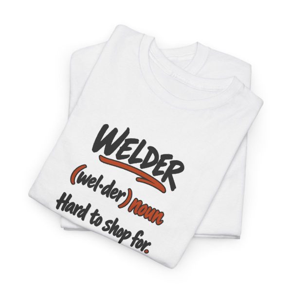 White hand-drawn T-shirt with the welder dictionary joke: Hard to shop for. Already built it., folded view