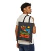 Birders. It was a leaf. I watched it for ten minutes. Tote - person-front Model carrying the tote on one shoulder, front print showing. Black flat vector tote bag with the birder joke: It was a leaf. I watched it for ten minutes.
