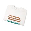 White flat vector crewneck sweatshirt with the social work dictionary joke: Knows every gas station bathroom in the county. Has them ranked., folded view