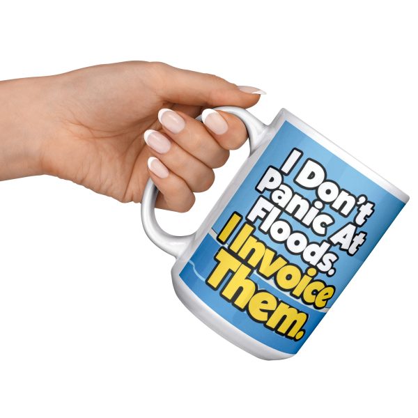 15 oz white ceramic plumber mug printed with "I Don't Panic At Floods. I Invoice Them.", raised in hand