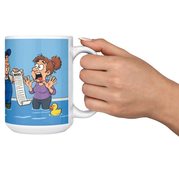 15 oz white ceramic plumber mug printed with "I Don't Panic At Floods. I Invoice Them.", held out by the handle
