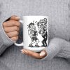 I COACH KIDS FOR FREE. PARENTS COST EXTRA. 15oz coach mug, held at chest 15 oz white ceramic youth coach mug printed with "I COACH KIDS FOR FREE. PARENTS COST EXTRA.", held at chest