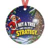 I HIT A TREE AND CALLED IT STRATEGY. round metal Christmas ornament, back view