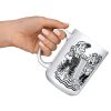 15 oz white ceramic plumber mug printed with "I DON'T PANIC AT FLOODS. I INVOICE THEM.", raised in hand