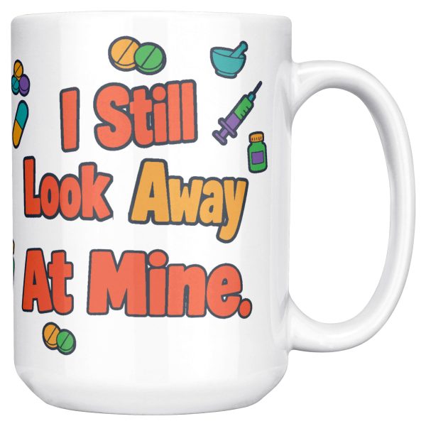 Gave 600 flu shots, still look away, and your team know 15oz mug, handle on the right, second side 15 oz white ceramic pharmacist mug, "Gave 600 flu shots this month" on one side and "I still look away at mine" on the other, with pills, bandages and syringes, handle on the right, second side