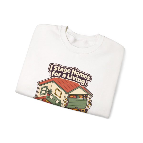 realty-crewneck-i-stage-homes-for-a-living-please-dont-open--3 White crewneck sweatshirt printed with "I Stage Homes for a Living. Please Don't Open My Garage.", folded view