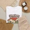 i-stage-homes-for-a-living-please-dont-open-my-garage-real-e-4 White T-shirt printed with "I Stage Homes for a Living. Please Don't Open My Garage.", styled flat lay