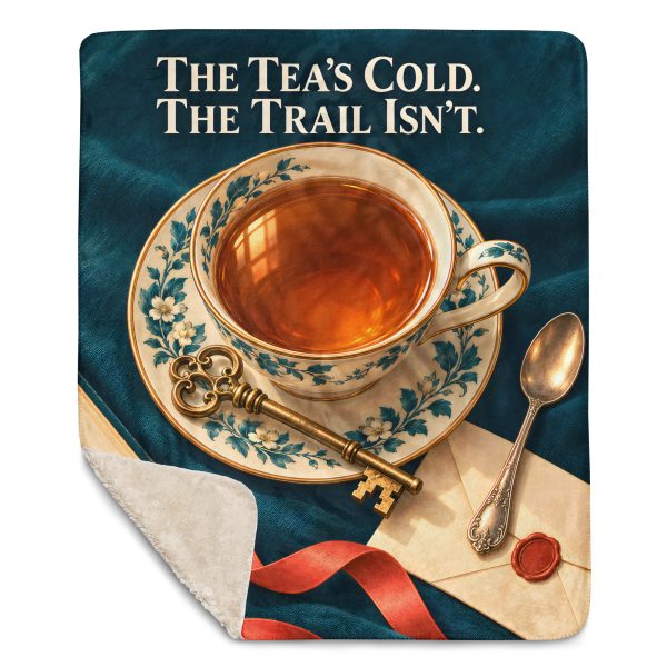 Tea and Books sherpa blanket laid flat with one corner folded back to show the soft cream sherpa reverse