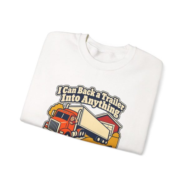 White crewneck sweatshirt printed with "I Can Back a Trailer Into Anything Except My Own Driveway.", folded view