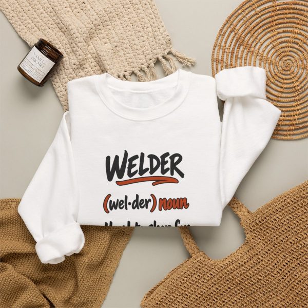 White hand-drawn crewneck sweatshirt with the welder dictionary joke: Hard to shop for. Already built it., folded view