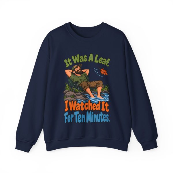 Watched a leaf for ten minutes and your bird club knows it. Sketch crewneck Navy hand-drawn crewneck sweatshirt with the birder joke: It was a leaf. I watched it for ten minutes.