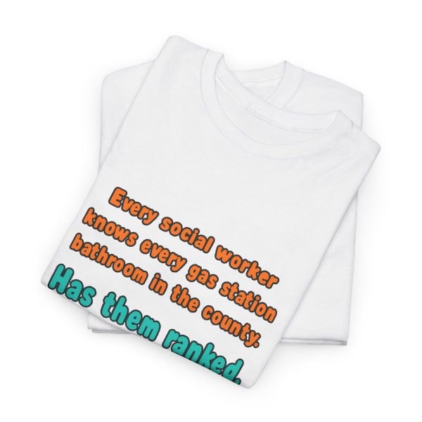 White flat vector T-shirt with the social work gas station bathroom ranking joke, folded view