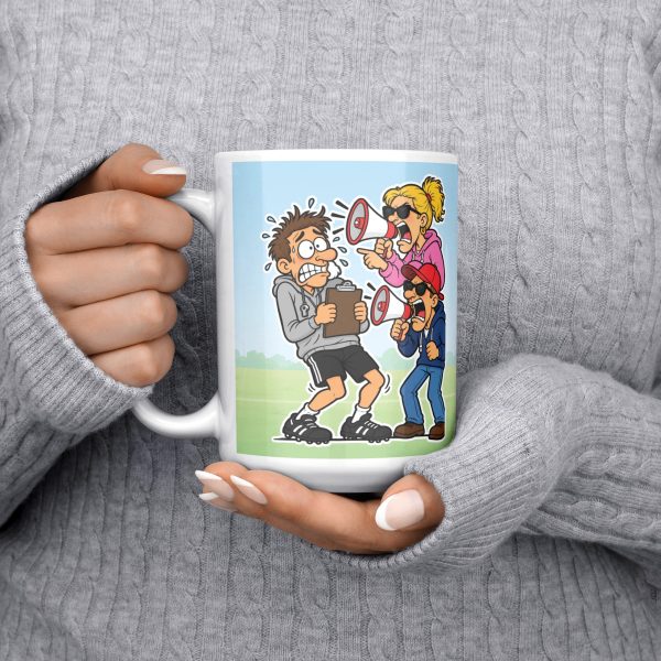 I COACH KIDS FOR FREE. PARENTS COST EXTRA. 15oz coach mug, held at chest 15 oz white ceramic youth coach mug printed with "I COACH KIDS FOR FREE. PARENTS COST EXTRA.", held at chest